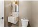 Chic half bathroom with unique sink, stylish fixtures, and minimalist design at 245 Roycroft Ln, Fayetteville, GA 30214