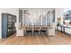 Elegant dining room with a long wooden table and stylish decor, perfect for Gathering gatherings at 245 Roycroft Ln, Fayetteville, GA 30214