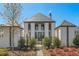 Beautiful exterior showcasing the home's elegant architecture and manicured landscaping at 245 Roycroft Ln, Fayetteville, GA 30214