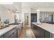 Well-appointed kitchen with sleek countertops, a gas range, and an island, great for entertaining at 245 Roycroft Ln, Fayetteville, GA 30214