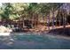 Backyard with trees, lawn, and putting green at 3554 Umatilla Sw Ln, South Fulton, GA 30331