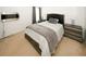 Contemporary bedroom features an electric fireplace and minimalist decor for modern comfort at 3554 Umatilla Sw Ln, South Fulton, GA 30331