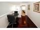 Cozy office space with dark hardwood floors and natural light, perfect for a home office at 3554 Umatilla Sw Ln, South Fulton, GA 30331