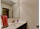 Bathroom with vanity, mirror, sink, and fixtures showcasing modern features at 4191 Secret Shoals Way, Buford, GA 30518