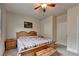 Bedroom with a bed and a wood frame at 4191 Secret Shoals Way, Buford, GA 30518