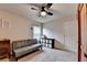 Bedroom featuring ceiling fan, carpet flooring, neutral walls and window bringing natural light at 4191 Secret Shoals Way, Buford, GA 30518