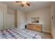 Bedroom featuring classic furnishings and neutral decor, offering a serene and inviting space at 4191 Secret Shoals Way, Buford, GA 30518