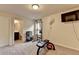 Bonus room includes work out equipment and an open doorway to the bathroom at 4191 Secret Shoals Way, Buford, GA 30518