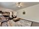 Spacious living room features hardwood floors and provides open access to the kitchen area at 4191 Secret Shoals Way, Buford, GA 30518