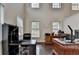 Bright office space featuring a large desk, vaulted ceilings, and natural light at 4191 Secret Shoals Way, Buford, GA 30518