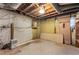 Unfinished basement with concrete floor, exposed ceiling, and a dehumidifier at 511 Oakview Rd, Decatur, GA 30030