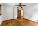 A bedroom features hardwood floors, white walls, and a ceiling fan for a cozy atmosphere at 511 Oakview Rd, Decatur, GA 30030