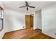Bedroom with hardwood floors, a ceiling fan, and a door leading to the closet or next room at 511 Oakview Rd, Decatur, GA 30030