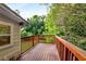 A wooden deck overlooking lush greenery provides a relaxing outdoor space at 511 Oakview Rd, Decatur, GA 30030