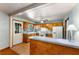 Classic kitchen with wood cabinets, breakfast bar, tile backsplash, ample lighting and a ceiling fan at 511 Oakview Rd, Decatur, GA 30030