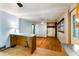 Cozy living room with hardwood floors, breakfast bar, and natural light from the windows at 511 Oakview Rd, Decatur, GA 30030