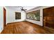 Inviting living room with gleaming hardwood floors, large windows providing natural light, and fresh, neutral paint at 511 Oakview Rd, Decatur, GA 30030
