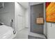 Spacious garage featuring speckled flooring, a Tesla charger, and convenient built-in storage at 6815 Halcyon Way, Alpharetta, GA 30005