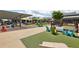 Inviting outdoor community space with colorful seating, ample gathering areas, and playful zones at 6815 Halcyon Way, Alpharetta, GA 30005