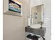 Chic powder room with a modern vessel sink, sleek vanity, and contemporary wall decor at 6815 Halcyon Way, Alpharetta, GA 30005