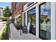 Charming retail storefront with brick facade, modern windows, and street-side accessibility at 6815 Halcyon Way, Alpharetta, GA 30005