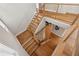 Elegant staircase with wooden steps and modern railings, showcasing the home's architectural design at 6815 Halcyon Way, Alpharetta, GA 30005