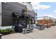 Outdoor patio area with comfortable seating options outside of the Branch & Barrel Tavern at 6815 Halcyon Way, Alpharetta, GA 30005