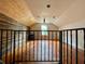 An attic space is enhanced with wooden floors, wooden walls and window letting in natural light at 1238 Trenton St, Atlanta, GA 30316
