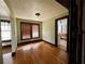 Charming dining area with hardwood floors, large windows, and dark trim accents at 1238 Trenton St, Atlanta, GA 30316