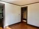 Hallway leading to a room and showcasing the unique spiral staircase at 1238 Trenton St, Atlanta, GA 30316