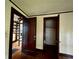 Hallway showcasing a unique spiral staircase and closet space at 1238 Trenton St, Atlanta, GA 30316