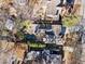 Aerial view of a home with a large backyard, featuring an in-ground pool, hot tub, and landscaped perimeter at 1352 Middlesex Ne Ave, Atlanta, GA 30306