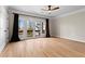 Spacious bedroom featuring hardwood floors, balcony access, and ample natural light at 1352 Middlesex Ne Ave, Atlanta, GA 30306
