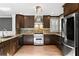 Modern kitchen with stainless steel appliances, sleek cabinets, and an island perfect for gourmet cooking and entertaining at 1352 Middlesex Ne Ave, Atlanta, GA 30306