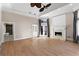 Spacious living room with hardwood floors, fireplace, and natural light from multiple windows and doors at 1352 Middlesex Ne Ave, Atlanta, GA 30306