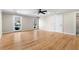 Main bedroom with hardwood floors, balcony access, and ensuite bathroom entry at 1352 Middlesex Ne Ave, Atlanta, GA 30306