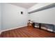 A bedroom featuring wood flooring, light-blue walls and natural light at 1417 Sterlingbrooke Dr, Powder Springs, GA 30127