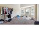 Bedroom with neutral-colored walls and carpeting, and natural light from multiple windows at 1417 Sterlingbrooke Dr, Powder Springs, GA 30127