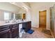 Bathroom featuring double vanity, shower and tub, and tile floor at 1417 Sterlingbrooke Dr, Powder Springs, GA 30127
