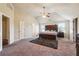 Spacious main bedroom with vaulted ceiling, neutral walls, and a large walk-in closet at 1417 Sterlingbrooke Dr, Powder Springs, GA 30127