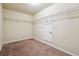 Spacious walk-in closet with built-in shelving and ample storage space at 1417 Sterlingbrooke Dr, Powder Springs, GA 30127