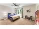 Bright bedroom with a ceiling fan, closet, and charming décor creating a delightful space at 2356 Defoors Ferry Nw Rd, Atlanta, GA 30318