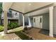 Charming front porch with gray siding, white trim, and a well-manicured lawn at 2356 Defoors Ferry Nw Rd, Atlanta, GA 30318