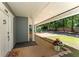 Charming front porch featuring a covered entrance with a potted plant and view of the neighborhood at 2356 Defoors Ferry Nw Rd, Atlanta, GA 30318