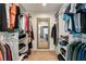 Spacious walk-in closet with ample shelving and clothing racks for organized storage at 2356 Defoors Ferry Nw Rd, Atlanta, GA 30318