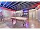 Finished basement with a pool table, bar area, and recessed lighting at 3715 Horizon Ct, Cumming, GA 30041