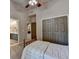 Comfortable bedroom featuring an ensuite bath, ample closet space, and neutral walls at 3715 Horizon Ct, Cumming, GA 30041