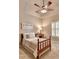Inviting bedroom featuring ample natural light, neutral wall colors, and comfortable carpet at 3715 Horizon Ct, Cumming, GA 30041