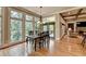 Dining room features natural light, hardwood floors and views to the backyard at 3715 Horizon Ct, Cumming, GA 30041