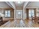 Bright and airy foyer with hardwood floors and elegant trim, creating a welcoming entrance to the home at 3715 Horizon Ct, Cumming, GA 30041